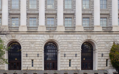 Photo of a government building made of stone with columns