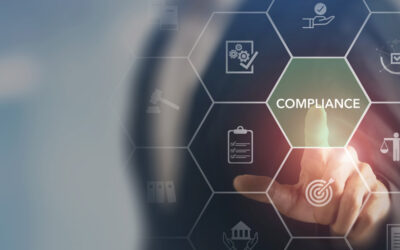 A person in a suit touches a virtual screen with hexagonal icons, highlighting the word