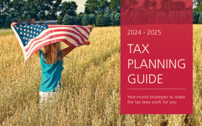 A person in a field holds up a U.S. flag. Text on a red overlay reads